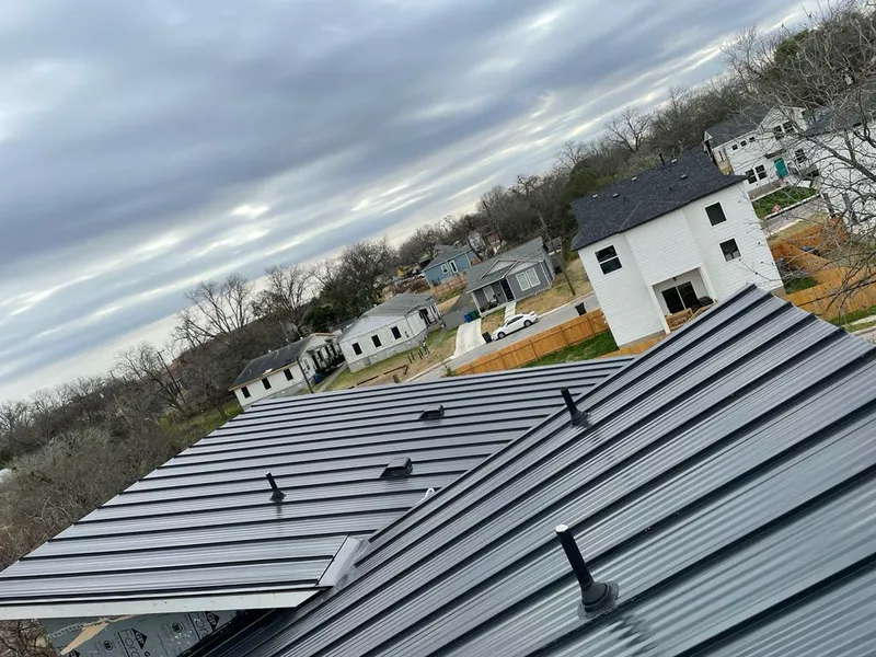 Standing seam metal roof panels with vents for Skylight Repair in Carson